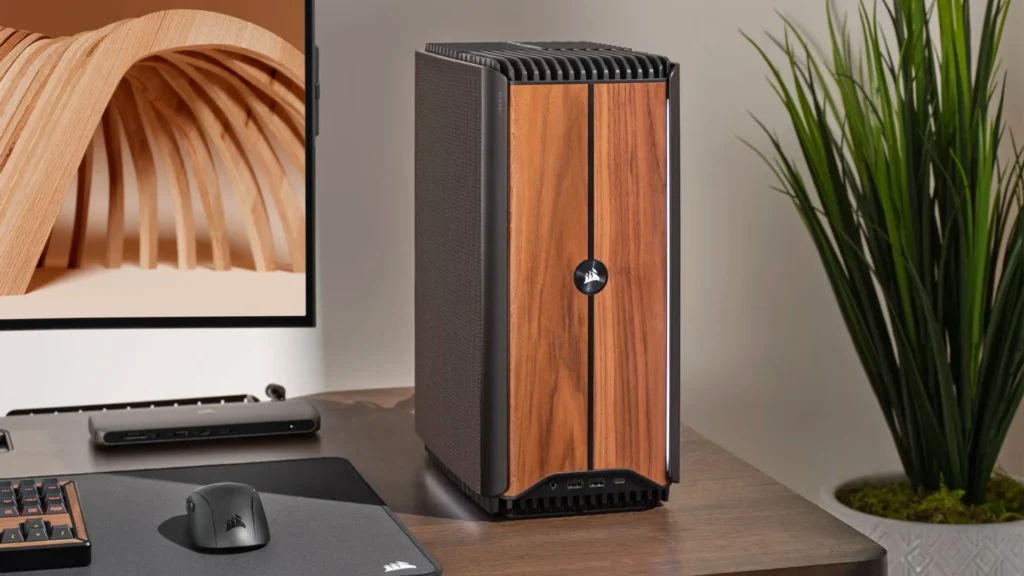 The wooden Corsair One i600 gaming PC on a desk
