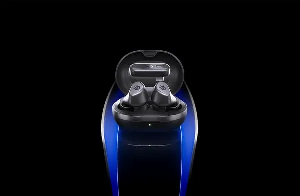 SteelSeries Arctis GameBuds in their charging case, with a subtle blue glow.