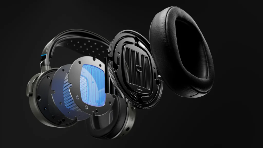 An exploded graphical view of the inside of the Audeze Maxwell 2 gaming headset's earcup showing layers and the drivers inside